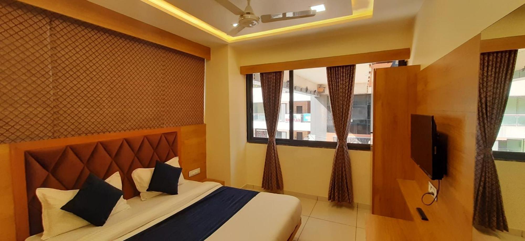 Hotel Suncity Ahmedabad Værelse billede